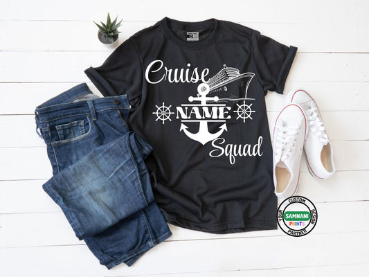 Flat lay of a black t-shirt with white cruise-themed graphic that reads “Cruise NAME Squad” featuring a ship, anchor, and ship wheels, styled with jeans, white sneakers, and a small plant on a white wood background. Personalized Cruise T-Shirt – Custom Name Cruise Shirt – Cruise Squad Matching Family Shirt – Group Cruise Outfits